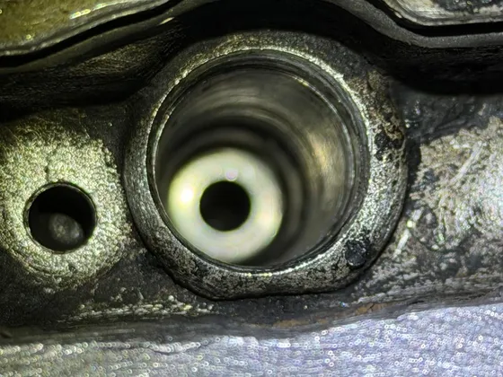 Spark plug tube inspected during diagnosis